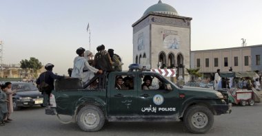 Taliban fighters patrol inside the city of Kandahar, southwest Afghanistan, Aug. 15, 2021. (AP Photo)