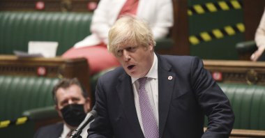 Britain's Prime Minister Boris Johnson speaks during Prime Minister's Questions in the House of Commons, London, Wednesday, July 7, 2021. (AP Photo)