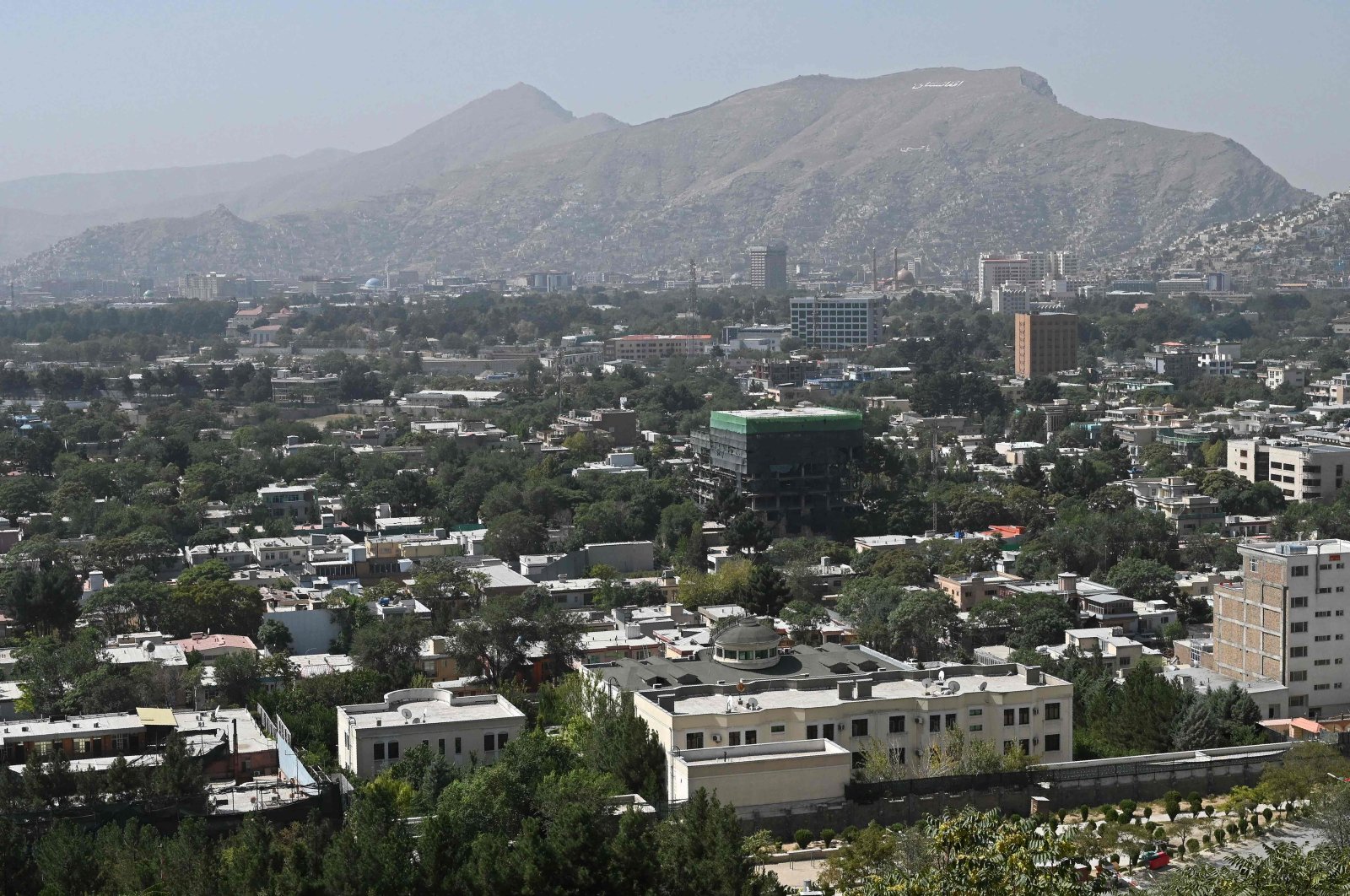 This picture taken from the top of a hillside shows a general view of the city of Kabul, Afghanistan, Aug. 15, 2021. (AFP Photo)