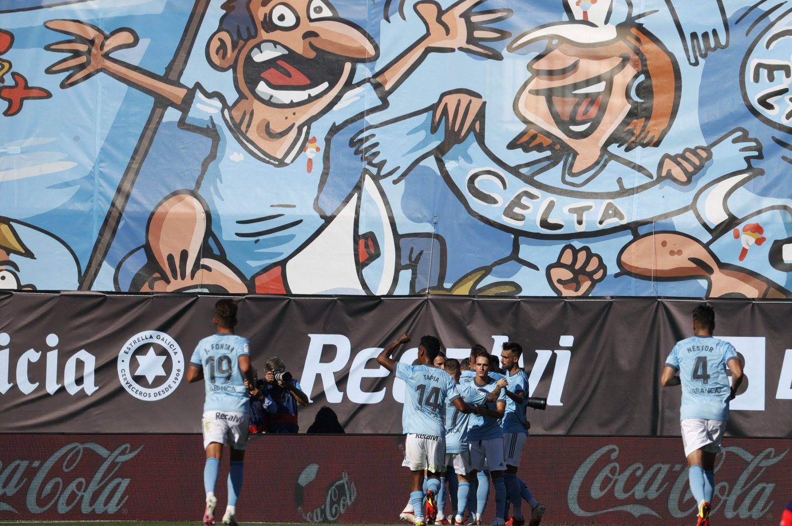 Celta de Vigo's players celebrate after scoring the 1-1 goal during a Spanish LaLiga soccer match between Celta de Vigo and Atletico Madrid at Balaidos stadium in Vigo, Galicia, Spain, Aug. 15, 2021. (EPA Photo)