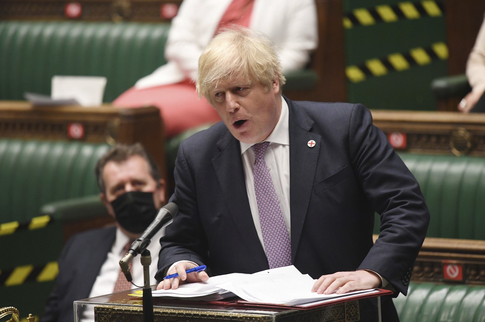 Britain's Prime Minister Boris Johnson speaks during Prime Minister's Questions in the House of Commons, London, Wednesday, July 7, 2021. (AP Photo)