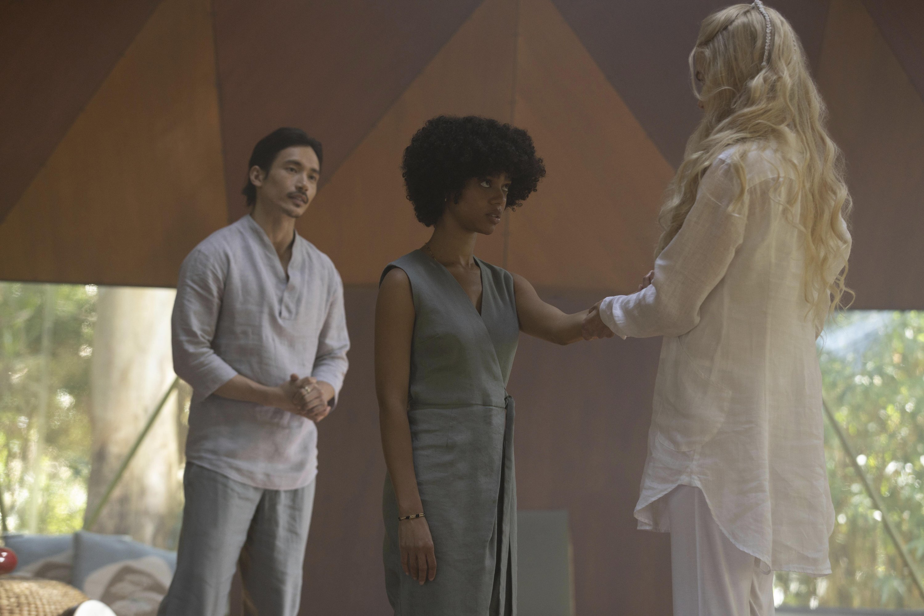 Manny Jacinto (L), Tiffany Boone (C) and Nicole Kidman in a scene from the series 'Nine Perfect Strangers,' premiering Aug. 18 on Hulu. (Hulu via AP)