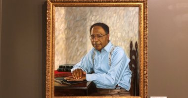 A portrait of late author Alex Haley hangs on the wall of the Alex Haley Museum and Interpretive Center, in Henning, Tennessee, U.S., Aug. 13, 2021. (AP Photo)