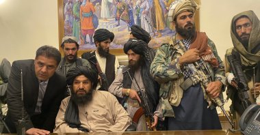 Taliban fighters take control of the Afghan presidential palace after Afghan President Ashraf Ghani fled the country, in Kabul, Afghanistan, Aug. 15, 2021. (AP Photo)