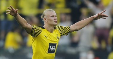 Borussia Dortmund's Erling Haaland celebrates scoring his side's fifth goal in a Bundesliga match against Frankfurt at Signal Iduna Park, Dortmund, Germany, Aug. 14, 2021.