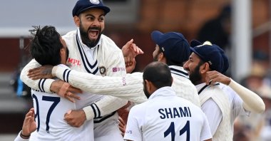 India's captain Virat Kohli (2nd L) celebrates teammates after a successful appeal for the wicket of England's Jonny Bairstow on Day 5 of the second Test at Lord's cricket ground, London, England, Aug. 16, 2021. (AFP Photo)