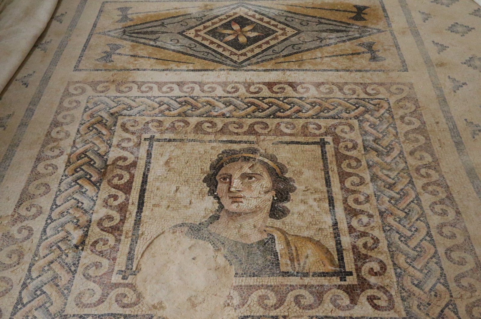 A mosaic of an ancient Greek muse in the House of Muses in the ancient city of Zeugma, Gaziantep, southeastern Turkey, Aug. 17, 2021. (AA Photo)