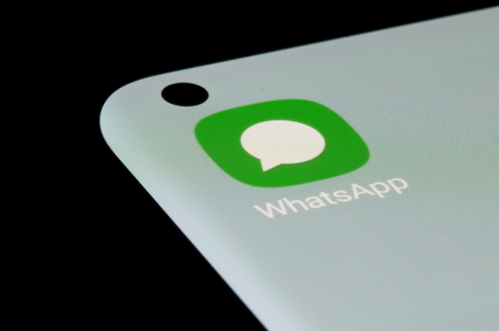 WhatsApp app is seen on a smartphone in this illustration taken, July 13, 2021. (Reuters Photo)
