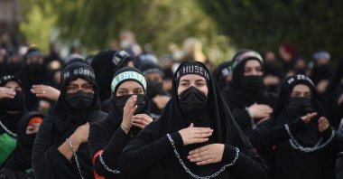 Jafari women beat their chests during a parade of remembrance, Kars, eastern Turkey, Aug. 18, 2021. (AA PHOTO)