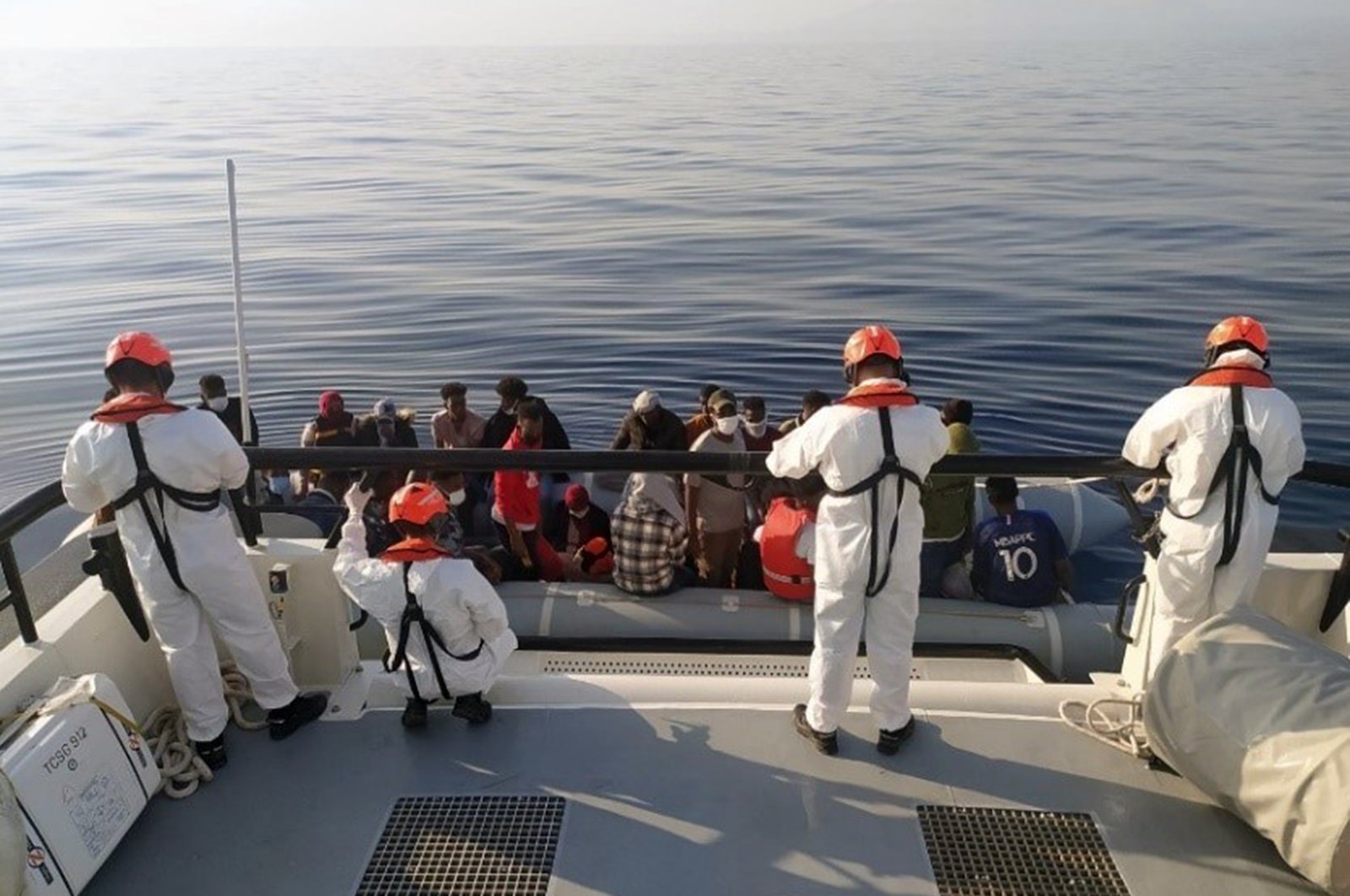 A total of 61 asylum-seekers pushed back by Greece were rescued off İzmir province's Dikili district, Turkey, Aug. 2, 2021 (AA Photo)