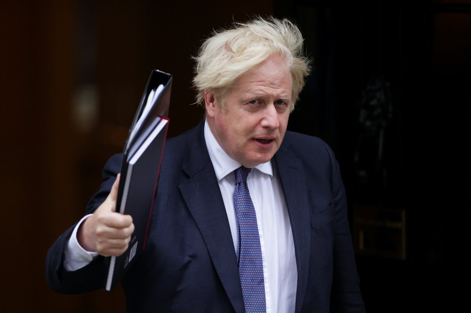 Britain's Prime Minister Boris Johnson walks outside Downing Street in London, U.K., on Aug.18, 2021. (REUTERS Photo)