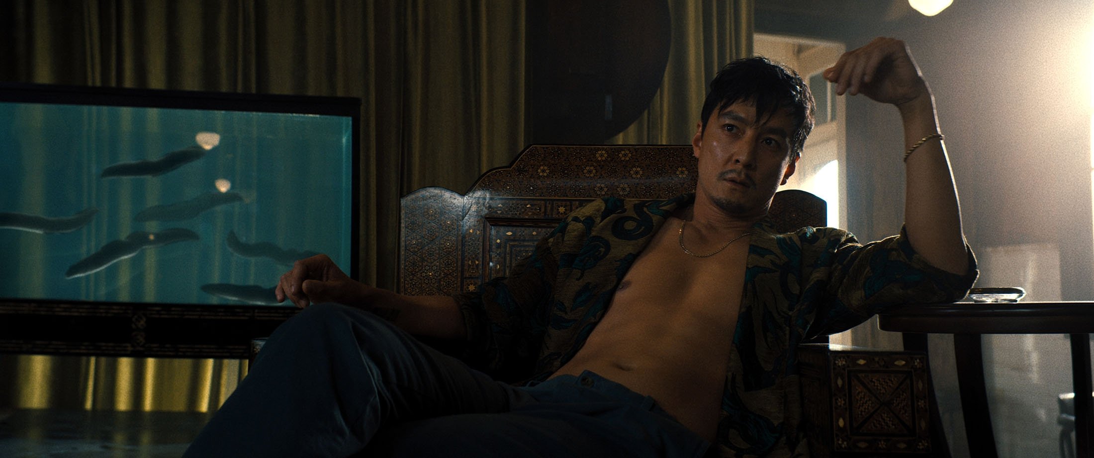 Daniel Wu in a scene from the film "Reminiscence." (Warner Bros. Pictures via AP)