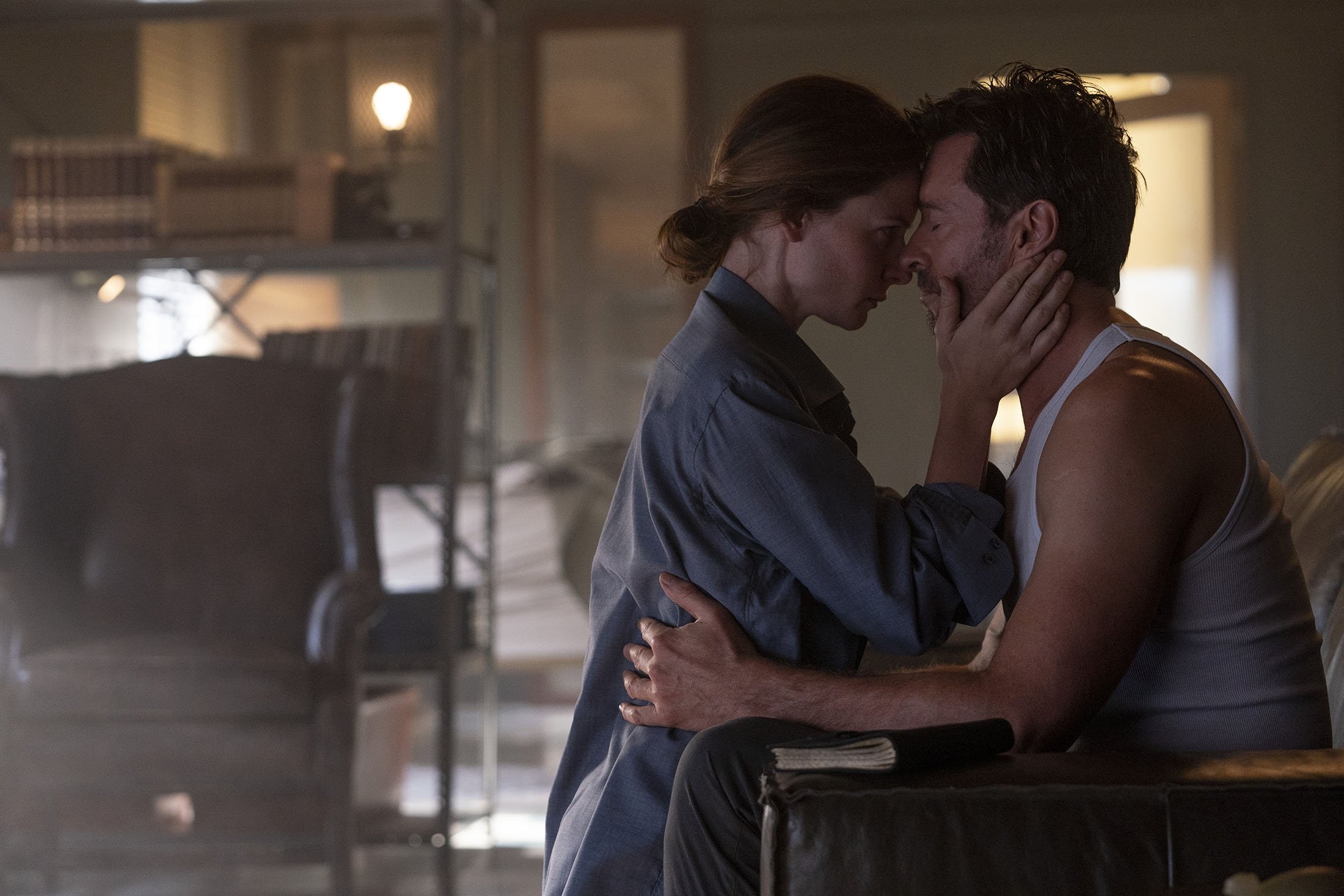 Rebecca Ferguson (L) and Hugh Jackman in a scene from the film "Reminiscence." (Warner Bros. Pictures via AP)