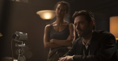 Thandiwe Newton (L) and Hugh Jackman in a scene from the film "Reminiscence." (Warner Bros. Pictures via AP)