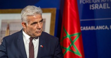 Israeli alternate Prime Minister and Foreign Minister Yair Lapid gives a news conference in Casablanca, Morocco, Aug. 12, 2021. (AFP Photo)