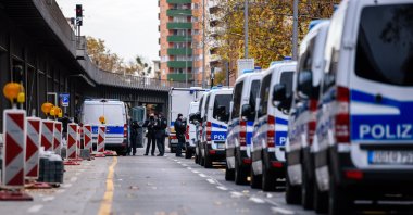 Police cars can be seen on Gitschiner Strasse during raids in which police arrested three suspects, Nov. 17, 2020. (Reuters Photo)