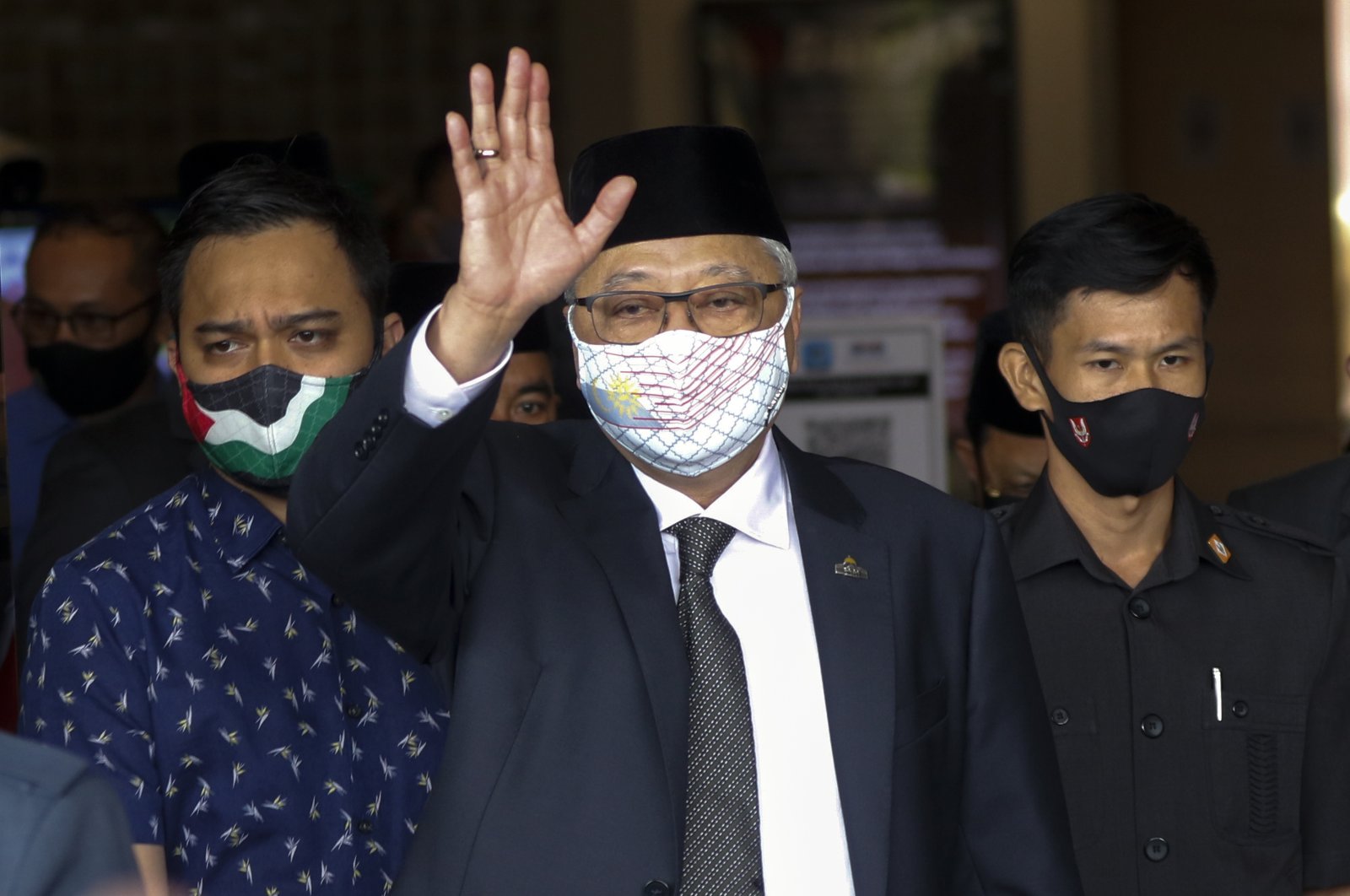 Former Malaysian Deputy Prime Minister Ismail Sabri Yaakob (C) reacts while leaving the United Malays National Organisation (UMNO) party headquarters, in Kuala Lumpur, Malaysia, Aug. 19, 2021. (EPA Photo)