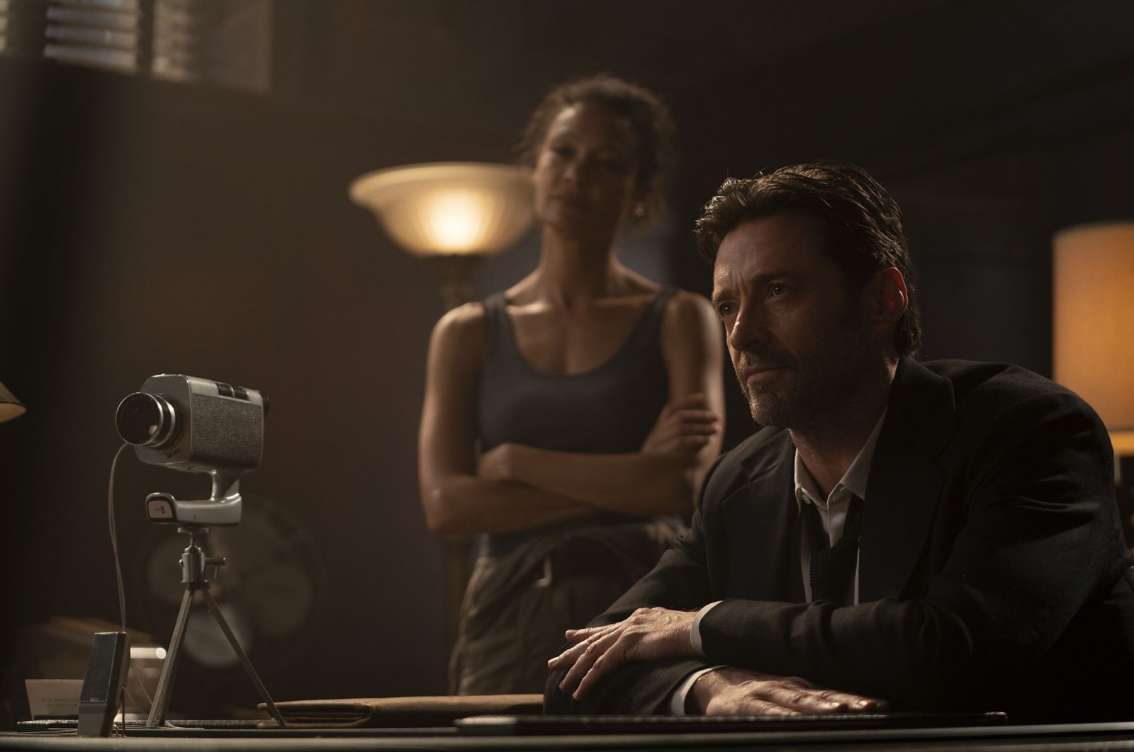 Thandiwe Newton (L) and Hugh Jackman in a scene from the film "Reminiscence." (Warner Bros. Pictures via AP)