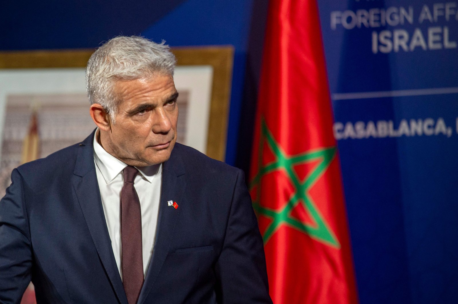 Israeli alternate Prime Minister and Foreign Minister Yair Lapid gives a news conference in Casablanca, Morocco, Aug. 12, 2021. (AFP Photo)
