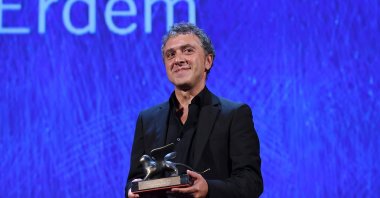 Director Reha Erdem poses with the Special Orizzonti Jury Prize for his movie "Koca Dünya" ("Big Big World") during the closing ceremony of the 73rd Venice Film Festival at Sala Grande on Sept. 10, 2016, in Venice, Italy.  (Getty Images)