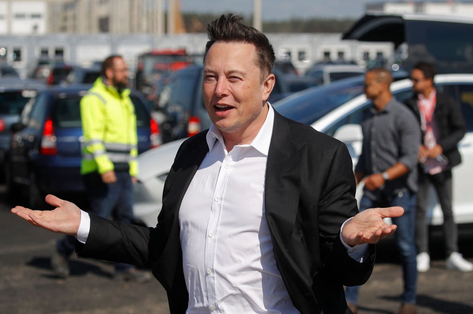 Tesla CEO Elon Musk gestures as he arrives at the construction site of the future factory of U.S. electric car giant Tesla, in Gruenheide near Berlin, Germany, Sept. 3, 2020.  (AFP Photo)