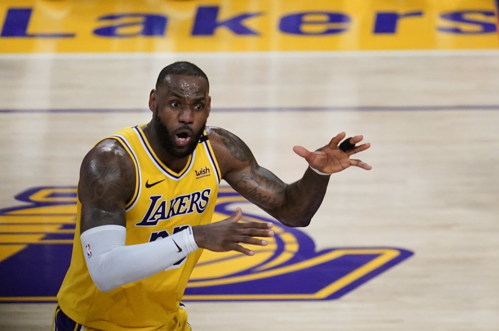 Los Angeles Lakers forward LeBron James reacts during NBA first-round Playoff Game 6 against the Phoenix Suns, Los Angeles, U.S., June 3, 2021. (AP Photo)