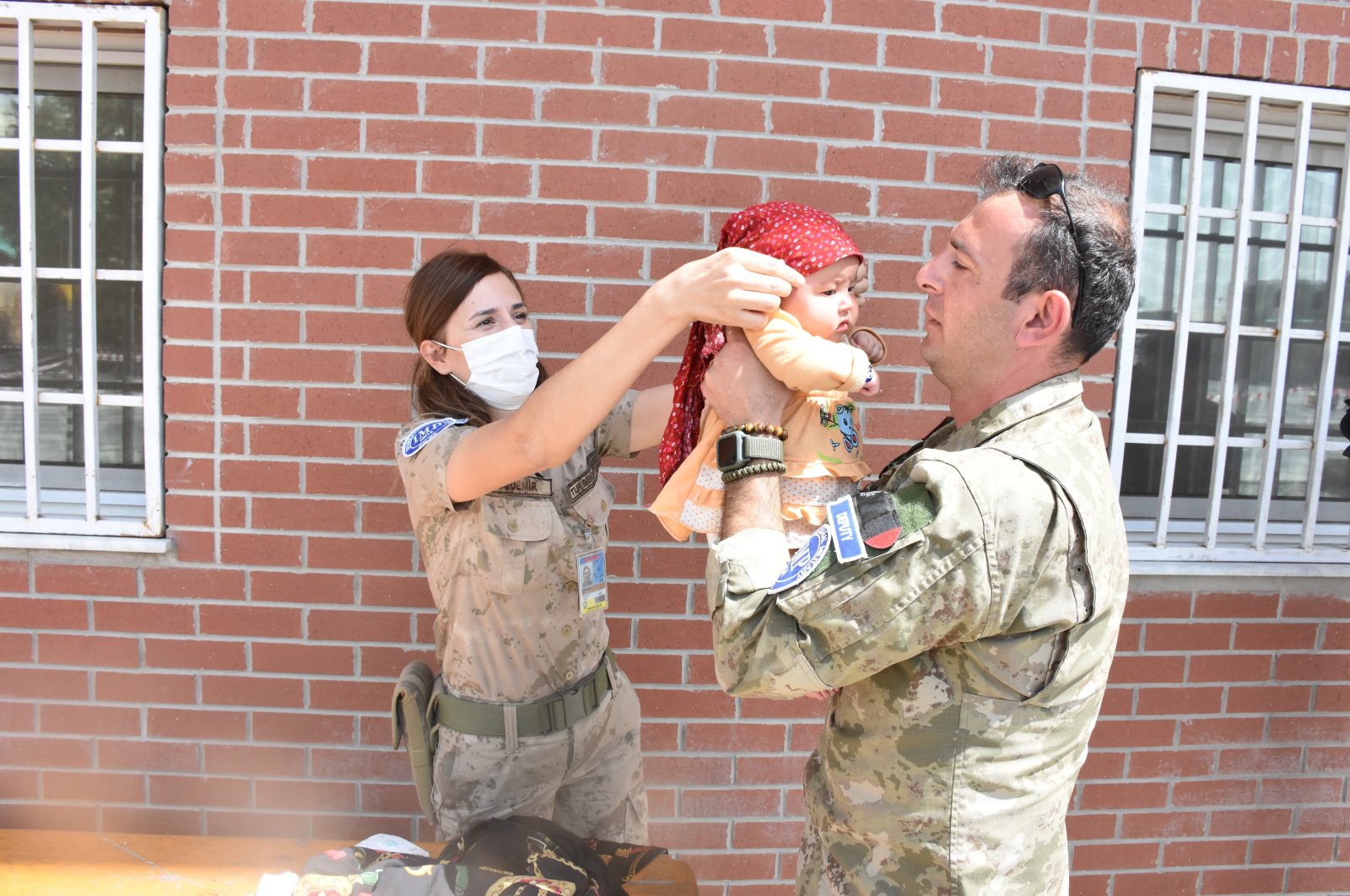 Turkish soldiers take care of 2-month-old baby Hadiya Rahmani, at Kabul Hamid Karzai International Airport, Afghanistan, Aug. 20, 2021. (AA Photo)