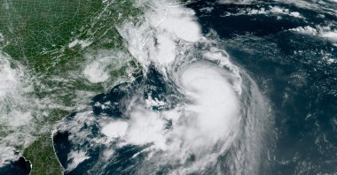 This National Oceanic and Atmospheric Administration (NOAA) satellite handout image shows Hurricane Henri at 3:01 p.m. GMT, on Aug. 21, 2021. (AFP Photo/ NOAA/GOES)