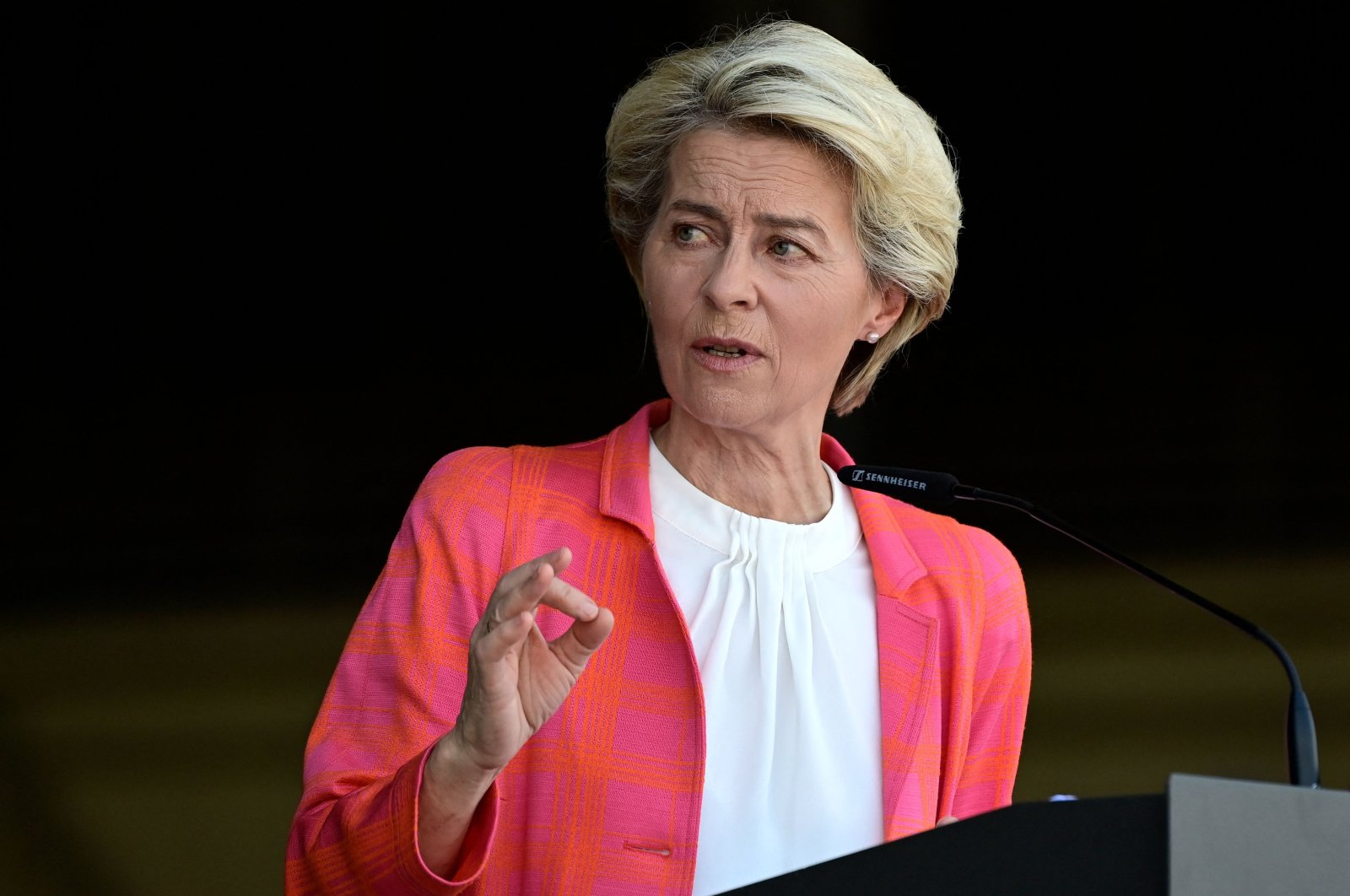 European Commission President Ursula von der Leyen gives a joint press conference with the Spanish prime minister and the European Council president as they visit a reception center for Afghan refugees who worked for the European bloc at the Torrejon de Ardoz military airbase near Madrid, Spain, Aug. 21, 2021. (AFP Photo)