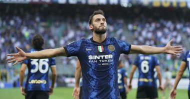 Inter Milan's Hakan Çalhanoğlu celebrates after scoring his side's 2nd goal in a Serie A match against Genoa at the San Siro, Milan, Italy, Aug. 21, 2021. (AP Photo)