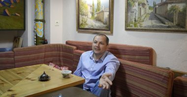 Erfan Kudusov talks during an interview with The Associated Press in Kyiv, Ukraine, Aug. 11, 2021. (AP Photo)