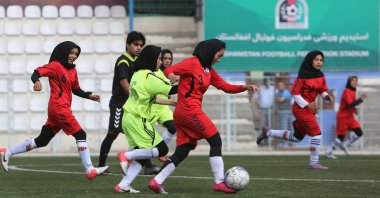 Afghan female footballers participate in a match to prepare for Afghanistan's first female football premier league, in Kabul, Afghanistan, June 2, 2014. (AP Photo)