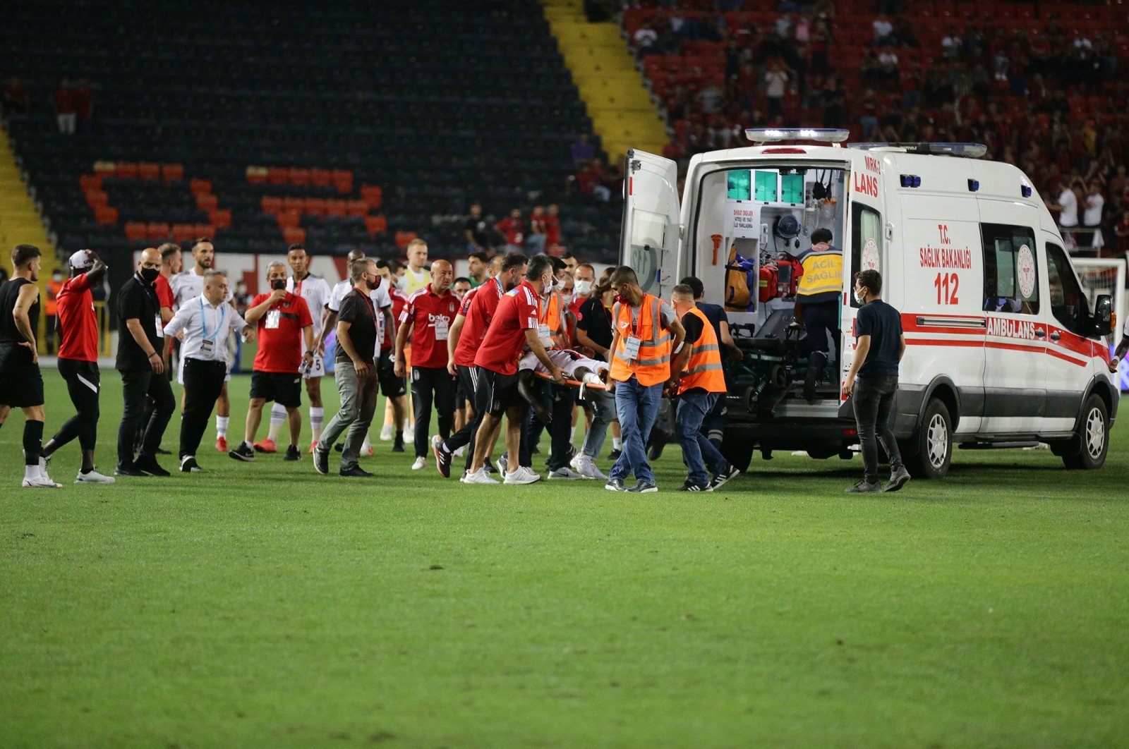 Beşiktaş defender Fabrice N'Sakala is carried on stretcher to an ambulance after his collapse during Beşiktaş match against Gaziantep in Turkish Süper Lig, at Kalyon Stadium, Gaziantep, Turkey, Aug. 21, 2021. (AA Photo)
