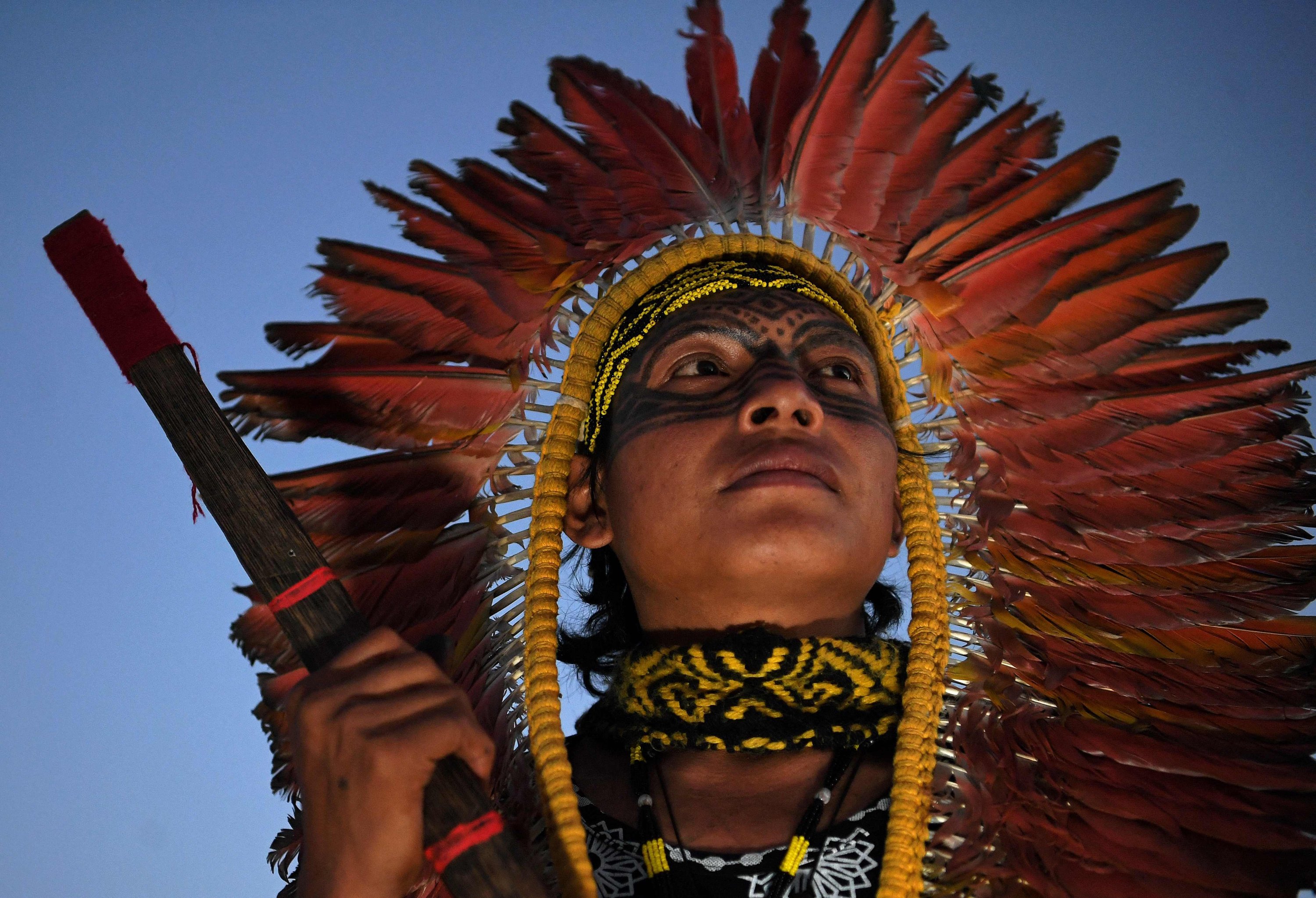 A member of the Huni Kuin tribe looks on during a protest camp in Brasilia, Brazil, Aug. 22, 2021. (AFP Photo)