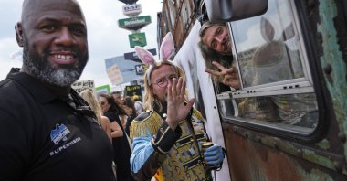 Organizers and fans of music festivals stage protests in Dutch cities against the government's COVID-19 restrictions on large-scale outdoor events, in Amsterdam, Netherlands, Aug. 21, 2021. (AP Photo)