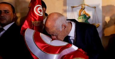 Tunisian President Kais Saied reacts after exit poll results were announced in a second round runoff of the presidential election in Tunis, Tunisia, Oct. 13, 2019. (REUTERS Photo)
