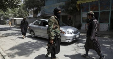 Taliban fighters stand guard at a checkpoint in the Wazir Akbar Khan neighborhood in the city of Kabul, Afghanistan, Aug. 22, 2021. (AP Photo)