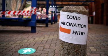 A view of signage in the AstraZeneca (Vaxzevria) COVID-19 Vaccination Clinic at Rockdale in Sydney, New South Wales, Australia, Aug. 23, 2021. (EPA Photo)