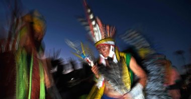 A member of the Huni Kuin tribe takes part in a ceremony at a protest camp in Brasilia, Brazil, Aug. 22, 2021. (AFP Photo)