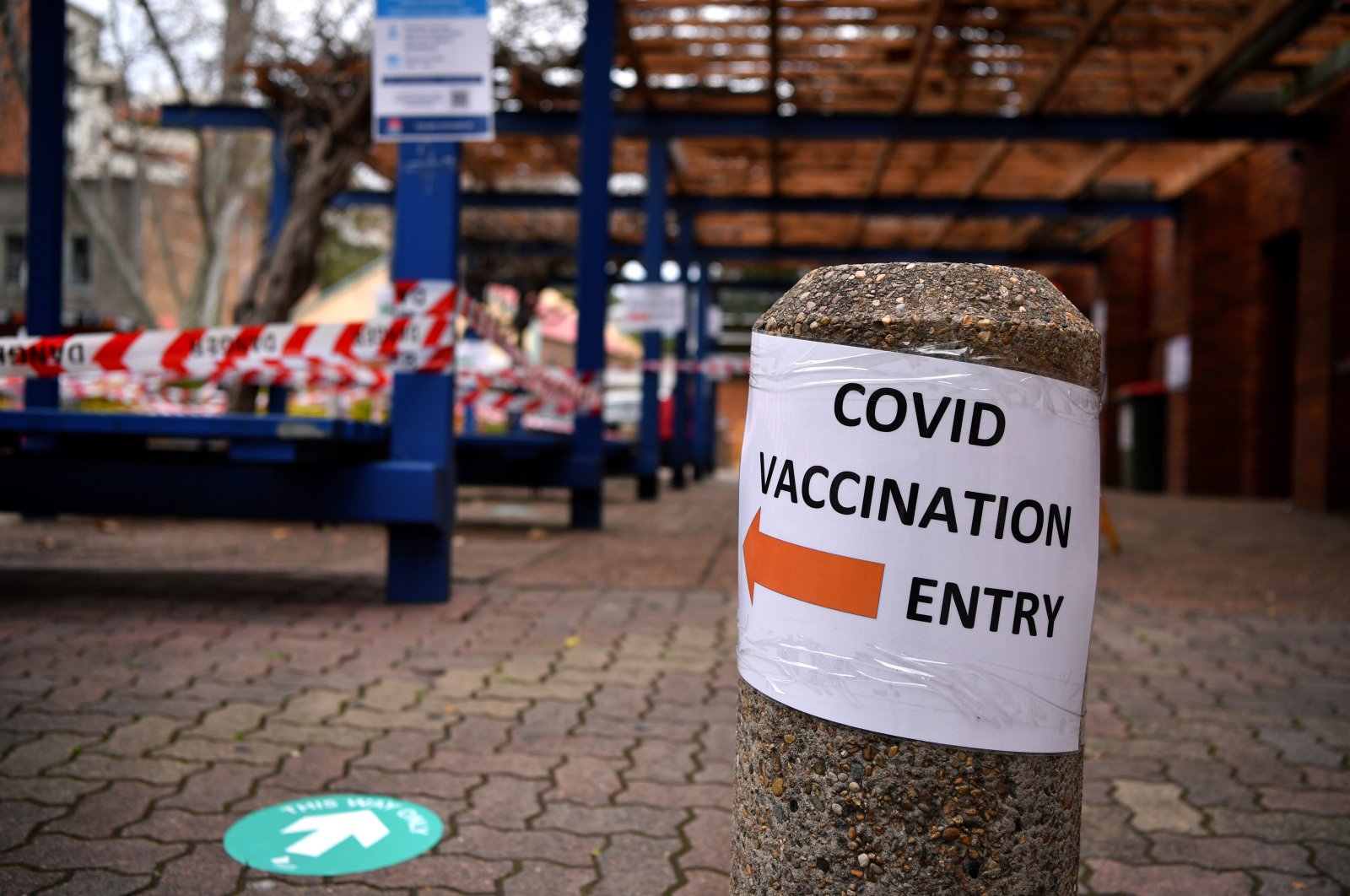 A view of signage in the AstraZeneca (Vaxzevria) COVID-19 Vaccination Clinic at Rockdale in Sydney, New South Wales, Australia, Aug. 23, 2021. (EPA Photo)