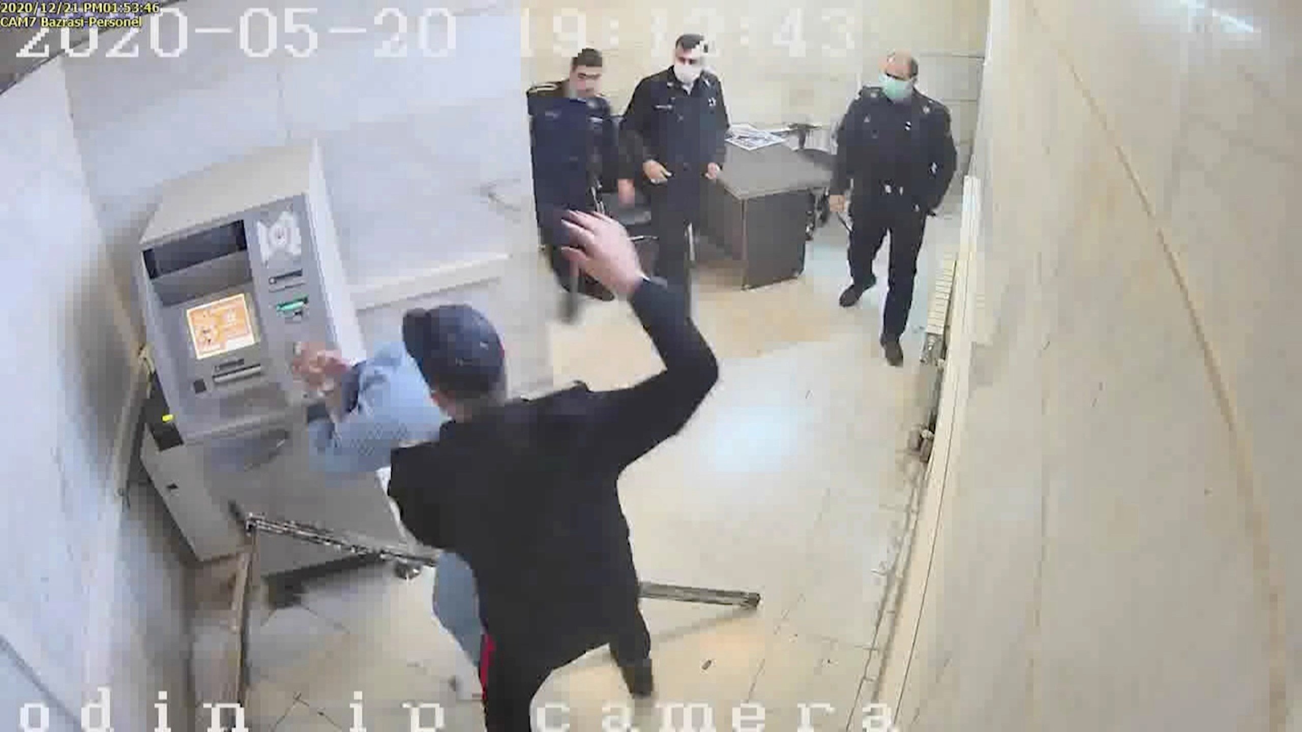 In this undated frame grab taken from video shared with The Associated Press by a hacker group called "The Justice of Ali," a guard beats a prisoner, at Evin prison, Tehran, Iran. (AP Photo)