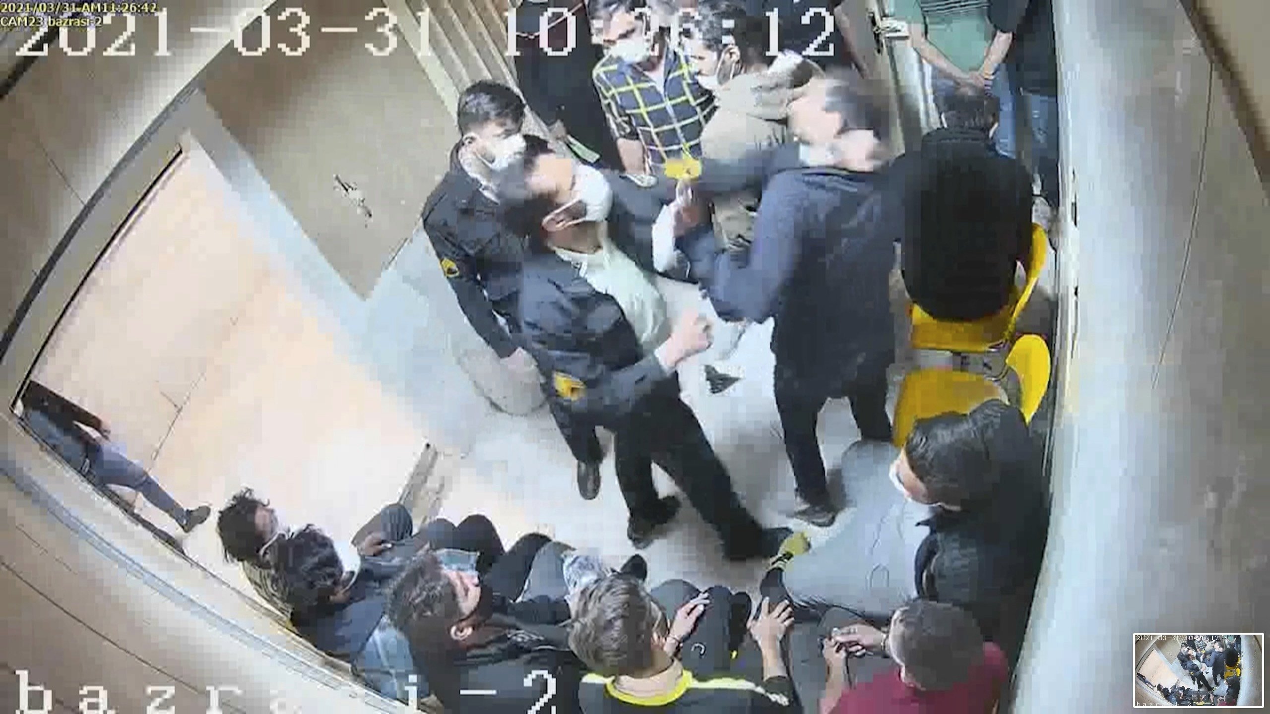 In this undated frame grab taken from video shared with The Associated Press by a hacker group called "The Justice of Ali," a guard beats a prisoner, at Evin prison in Tehran, Iran. (AP Photo)