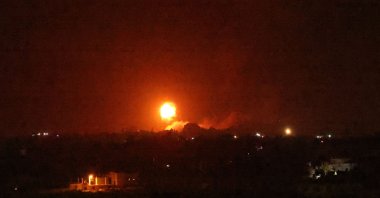 A fireball rises following an airstrike in Khan Yunis in the southern Gaza Strip, Palestine, Aug. 23, 2021. (AFP Photo)
