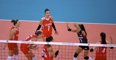 Turkish national volleyball team players celebrate after scoring during a EuroVolley 2021 group stage match at the BT Arena in Romania's Cluj-Napoca on Aug. 23, 2021 (AA Photo)