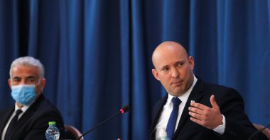 Israeli Prime Minister Naftali Bennett chairs the weekly Cabinet meeting, as Alternate Prime Minister and Foreign Minister Yair Lapid (L) looks on, in West Jerusalem, Israel, Aug. 22, 2021. (Reuters Photo)