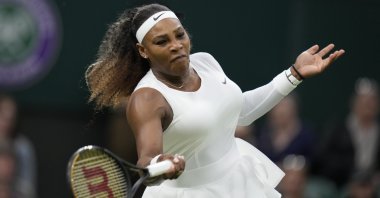 Serena Williams plays a return to Aliaksandra Sasnovich at a Wimbledon women's singles first-round match in London, England, June 29, 2021. (AP Photo)