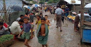 Rohingya refugees walk along a path at Kutupalong refugee camp in Ukhia, Bangladesh, Aug. 25, 2021. (AFP Photo)