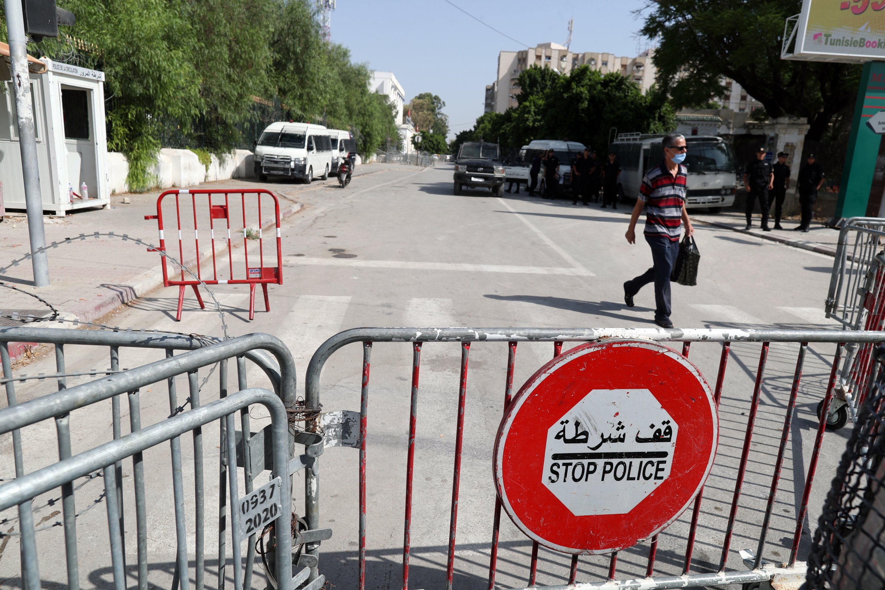 Police cars guard a side entrance of the Tunisian Parliament building in Tunis, Tunisia, Aug. 24, 2021. (EPA Photo)