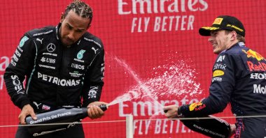 Red Bull driver Max Verstappen (R) celebrates winning the French Formula One Grand Prix with second-placed Lewis Hamilton at the Paul Ricard racetrack in Le Castellet, southern France, June 20, 2021. (AP Photo)