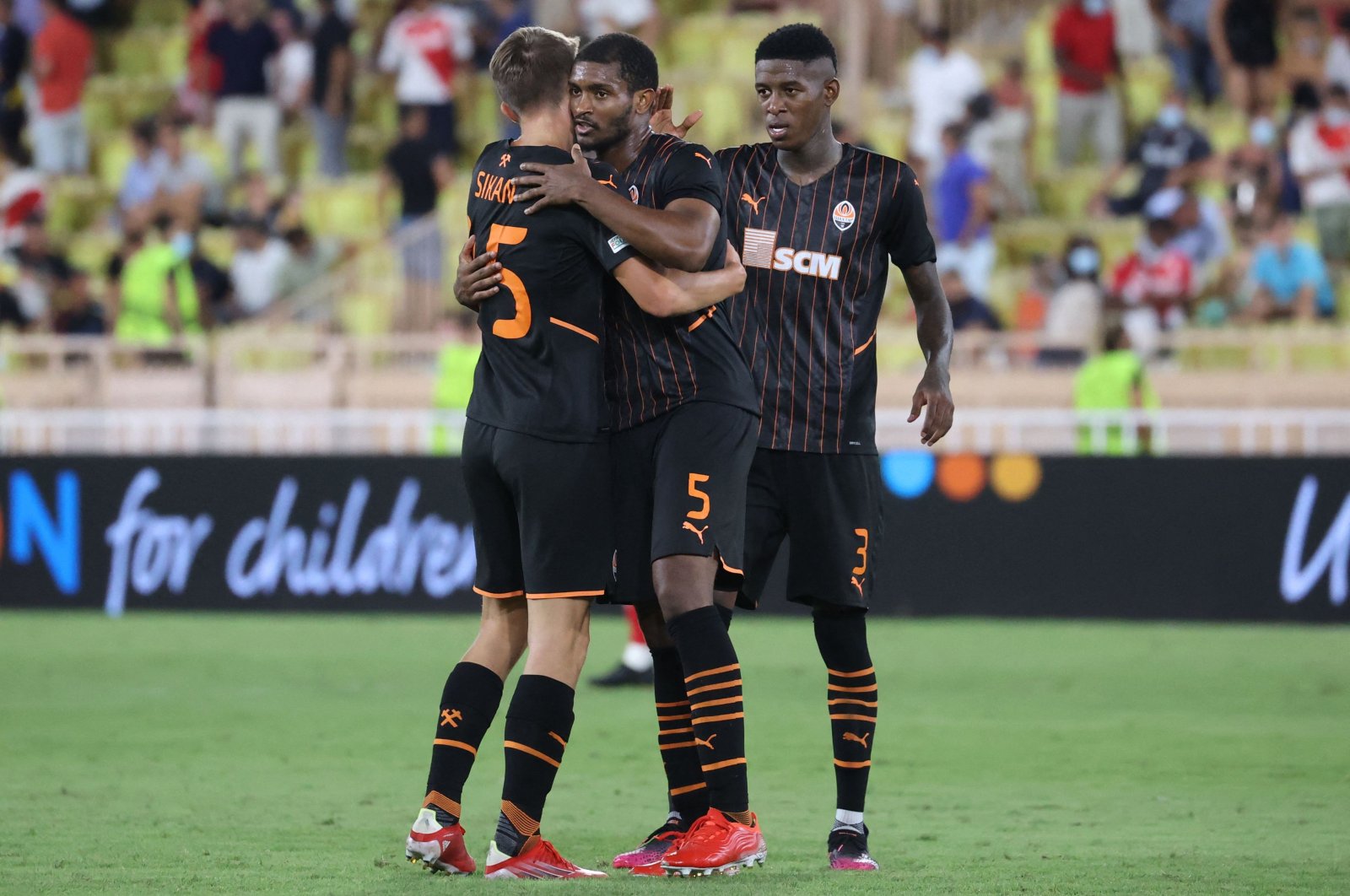Shakhtar Donetsk's players react at the end of their UEFA Champions League playoff win against Monaco at "Louis II" stadium in Monaco, Aug. 17, 2021. (AFP Photo)